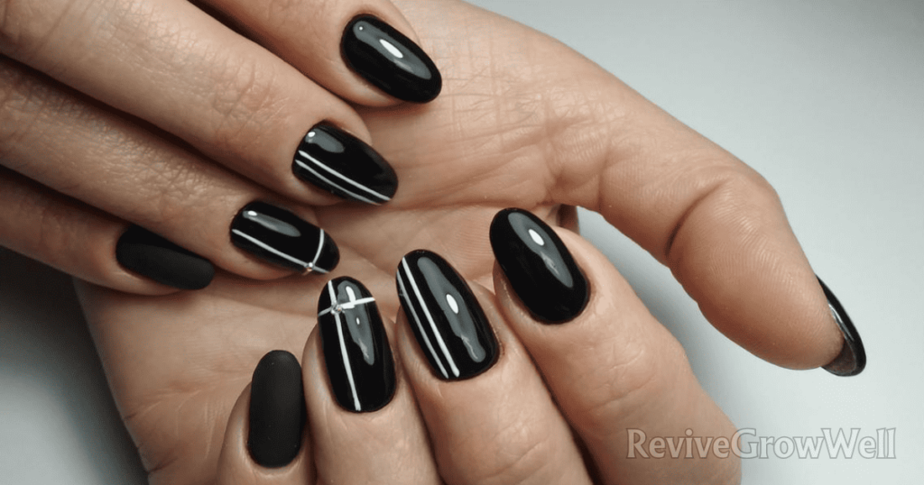 black-oval-nail-design-with-white-lines
