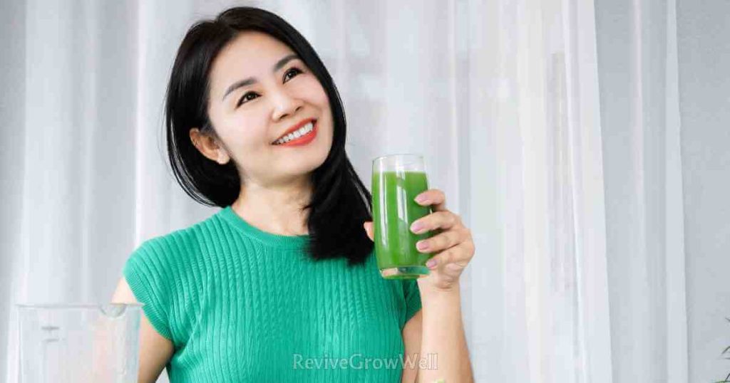 a girl is enjoying a liver detox smoothie.